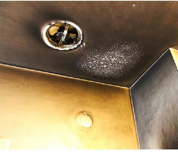 smoke damage on wall and ceiling
